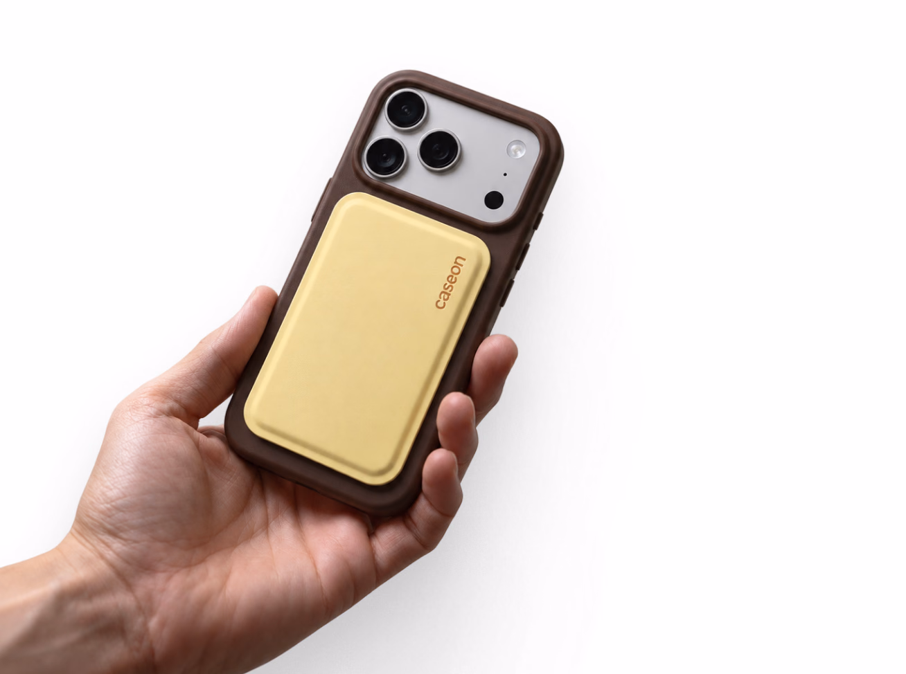 Hand holding an iPhone in the Caseon Core case