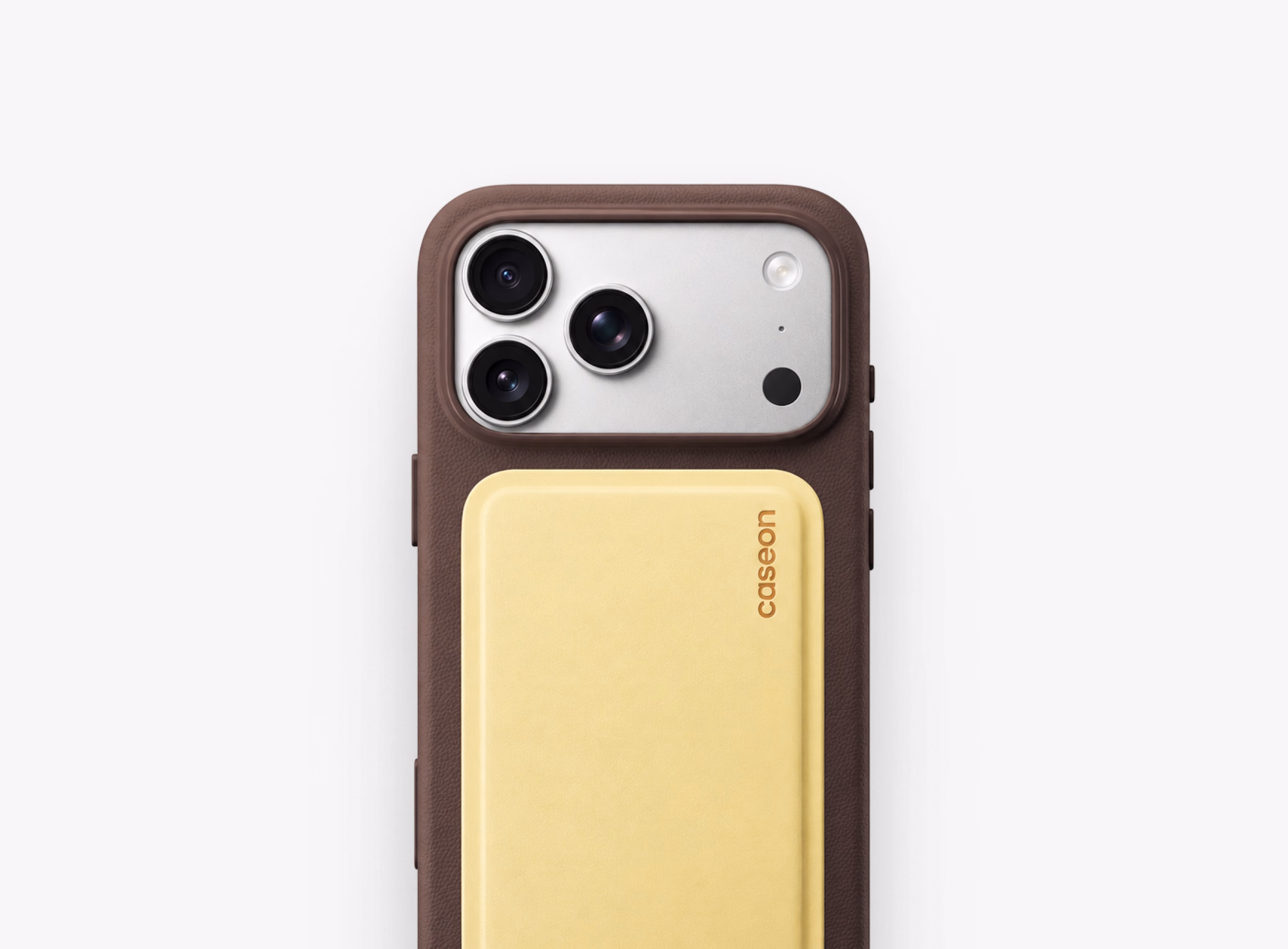iPhone in the Caseon Core case with a sand MagSafe wallet